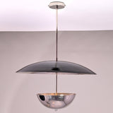 Side view of modern chrome brass chandelier with sculpted disc and bowl-shaped brass form