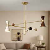 Modern solid brass 6-light diabolo style chandelier with double cone shades in contemporary living room interior