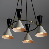 Modern Diabolo chandelier featuring illuminated cone shades with solid brass structure and refined industrial design