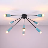 Modern orbit-style 8-light brass flush mount chandelier illuminated with warm ambient lighting