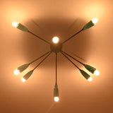Modern orbit ceiling chandelier creating dramatic indirect lighting and soft shadows