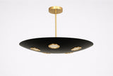 Side view of orbit disc brass chandelier showing slim rod suspension and bowl-shaped black brass shade with integrated lighting.