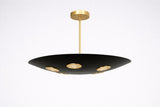 Modern disc-style brass chandelier with black bowl shade and brushed brass details, designed for minimalist and industrial interiors.