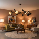 Orion 16 light black Mid-Century chandelier illuminated angled view