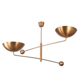 Oslo 2-light bowl chandelier creating warm upward ceiling glow with sculptural solid brass design