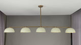 360° view of a modern 72-inch linear brass chandelier with five dome-shaped enamel shades, showcasing warm ambient lighting, minimalist silhouette, and sleek ceiling mount in various room settings.