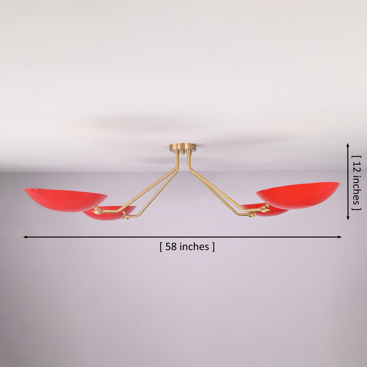 Sculptural red disc flush mount chandelier in solid brass showing 58 inch width and 12 inch height with minimalist bowl shade design.