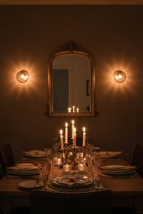 Ribbed glass bedroom wall sconce with warm light diffusion and elegant round globe design