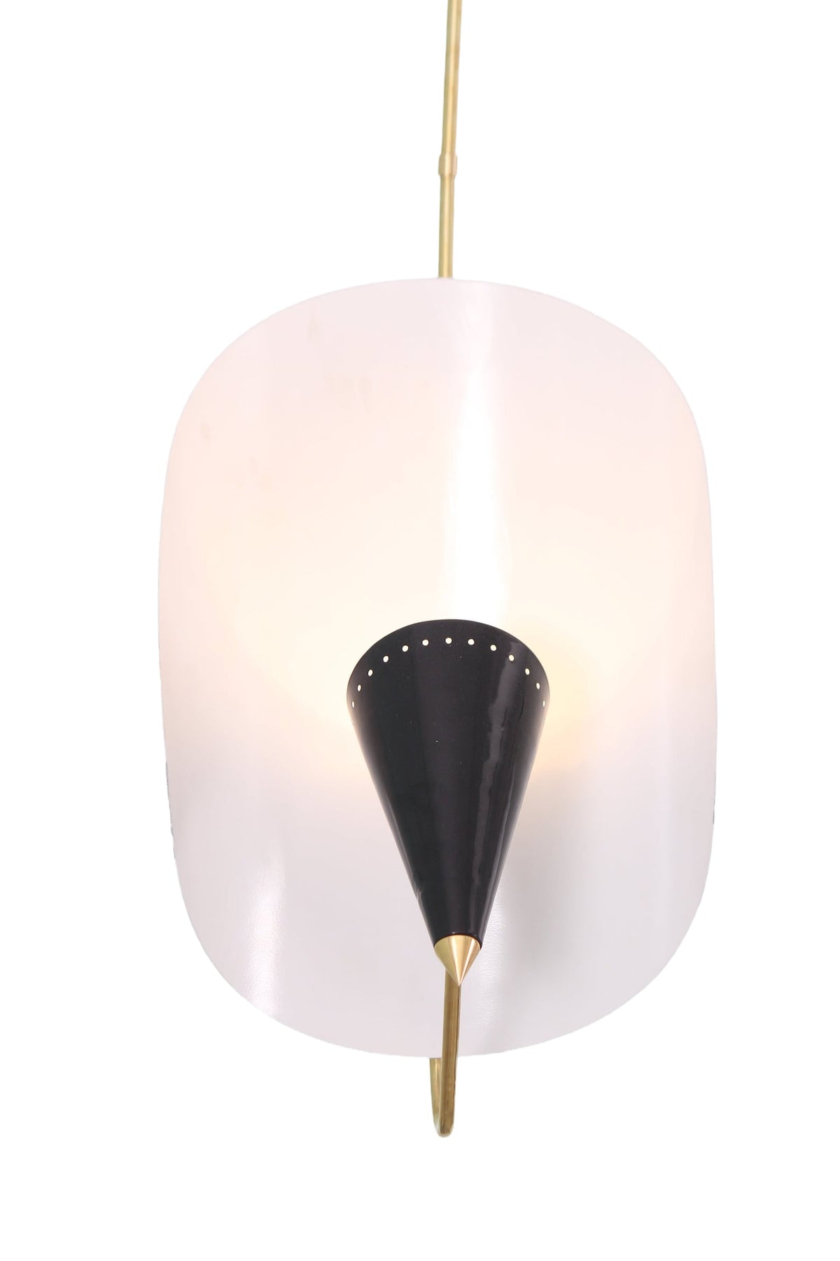 Close up detail of black cone shade with perforated rim on modern brass chandelier with curved metal backplate