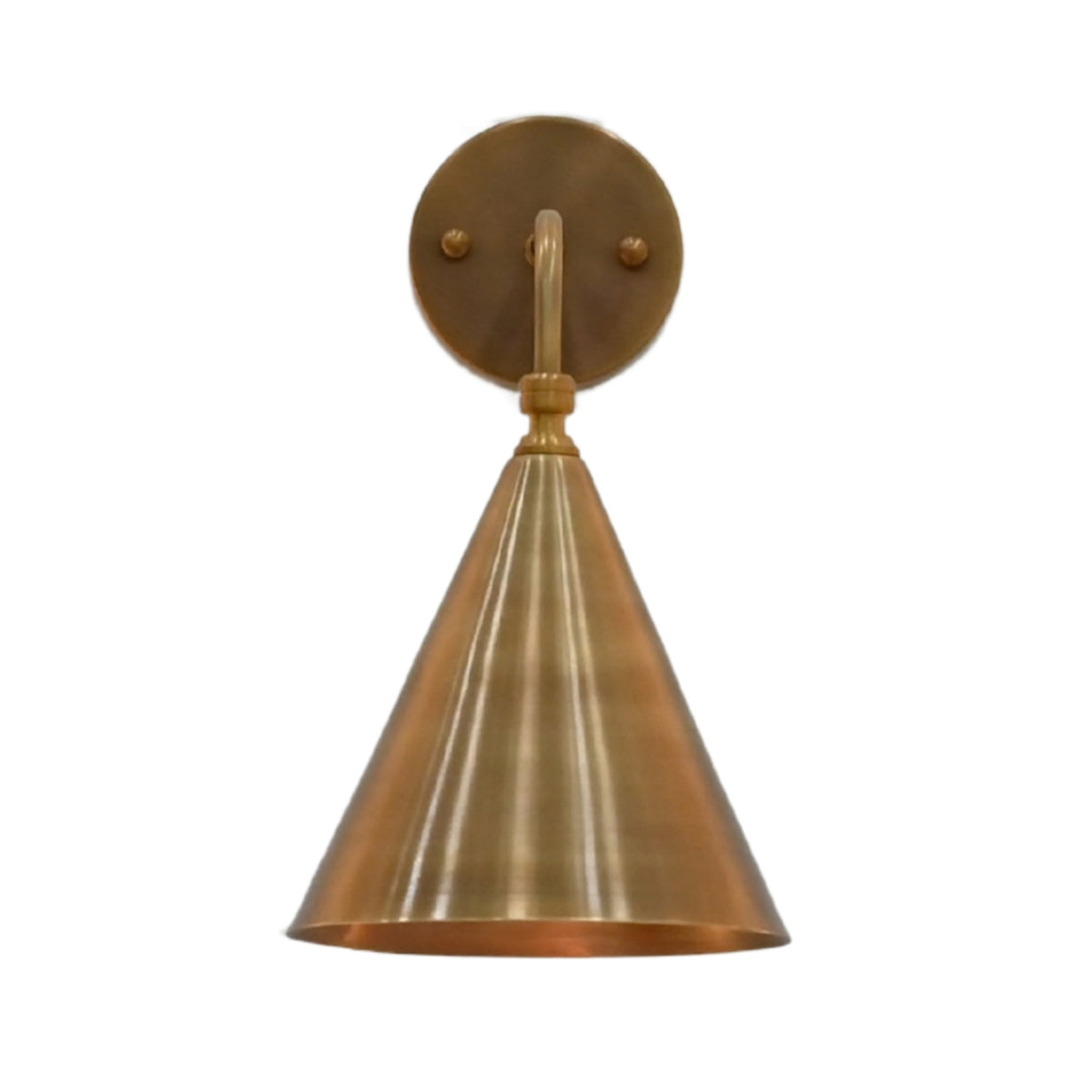 Seville brass cone wall sconce with curved arm, round canopy and warm brass patina finish