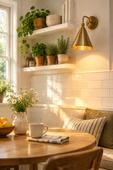 Seville brass wall sconce dimension view showing approximately 10 inch width and 13 inch height