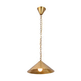 Solara brass cone pendant light hanging above a dining table with warm downward glow for elegant home interiors