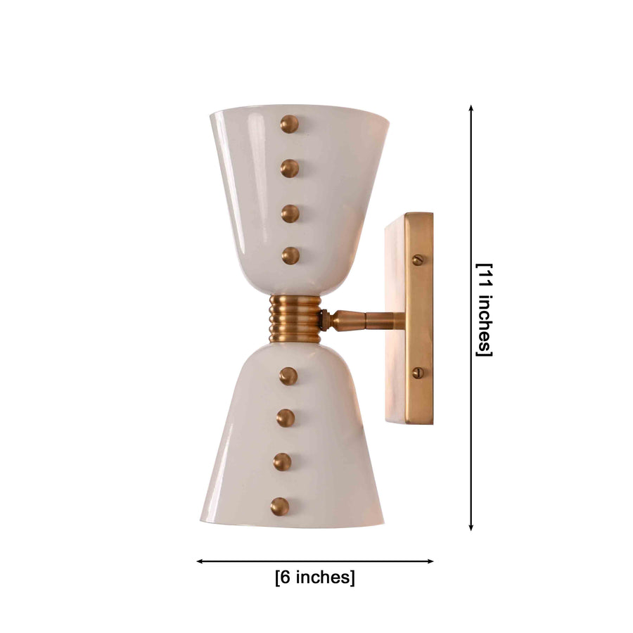 Luma Diabolo 2-light wall sconce shown in a styled living room with warm up and down wall glow