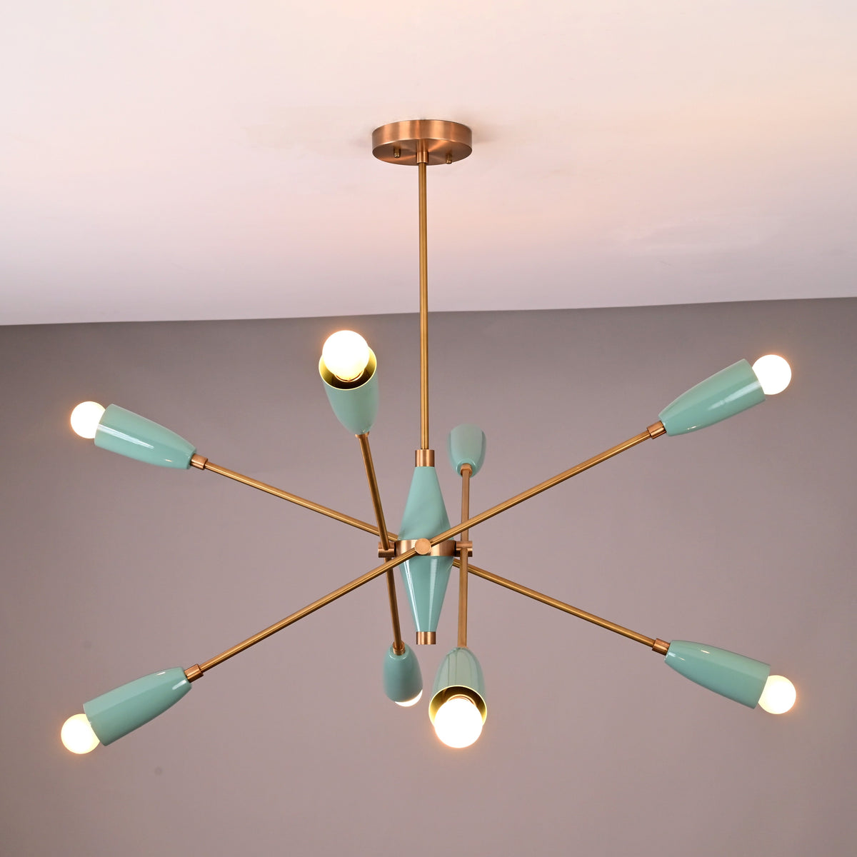 Teal cone shade 8-light Sputnik chandelier with a brushed brass frame, stylish mid-century statement lighting.