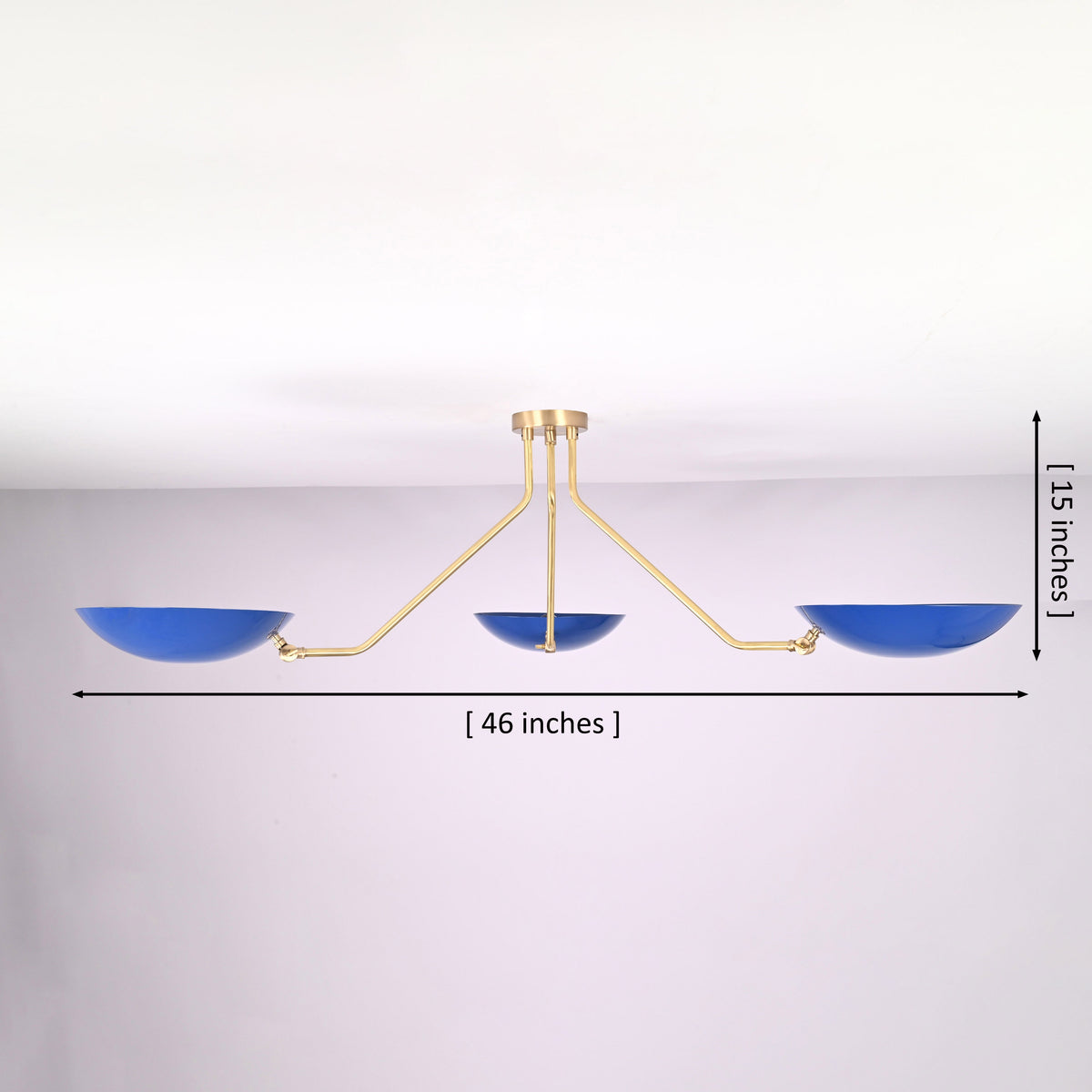 Three-light brass flush mount ceiling light with blue bowl shades showing 46 inch width and 15 inch height dimensions