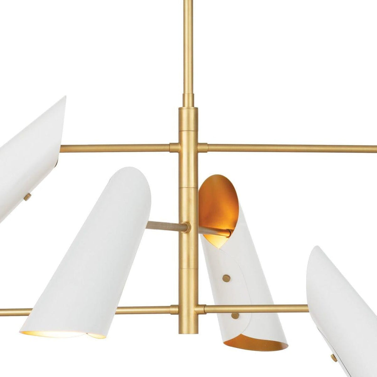 Center detail of white cone chandelier with brushed brass arms and warm reflective interiors